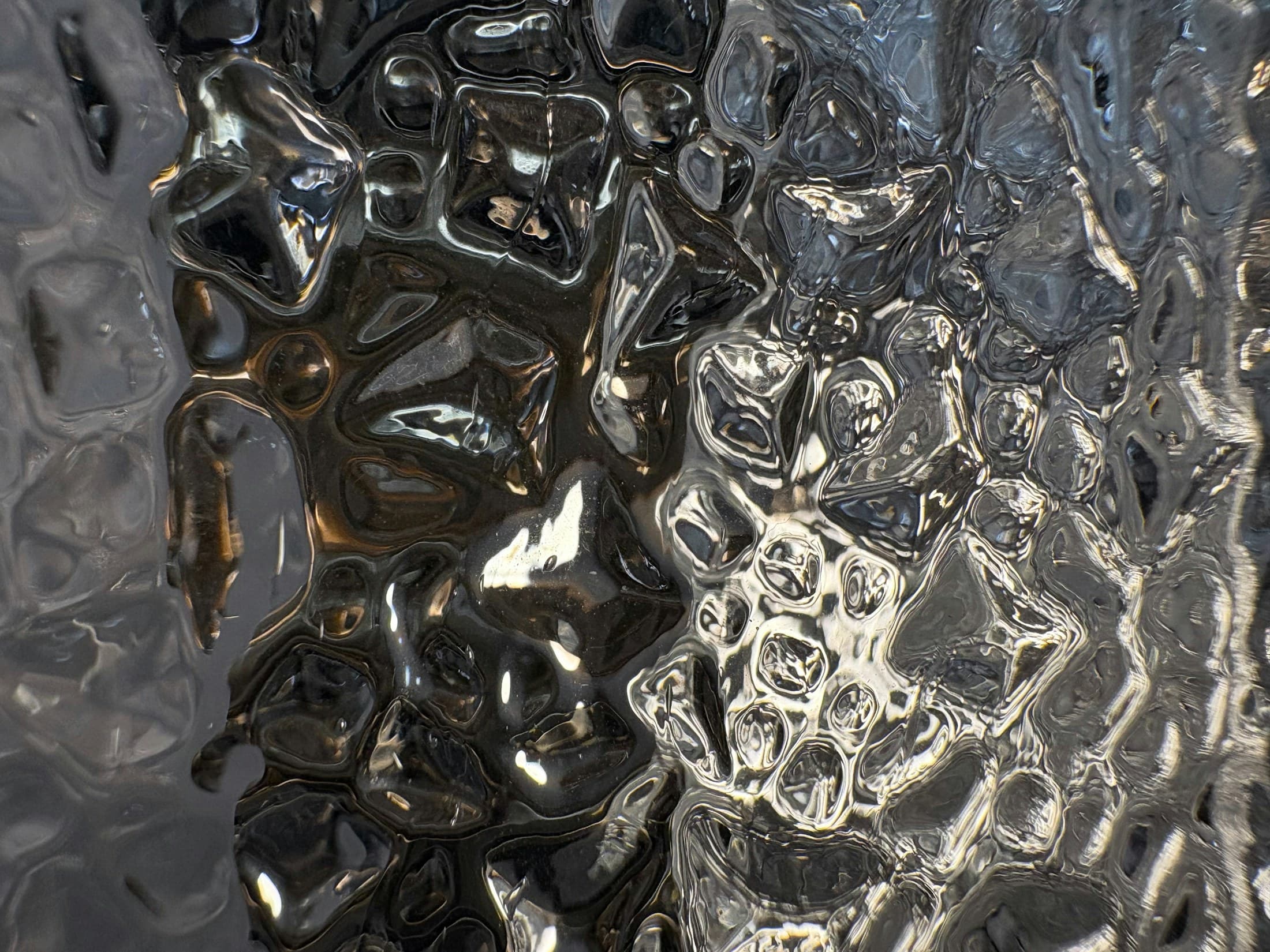 Abstract light reflected through textured glass